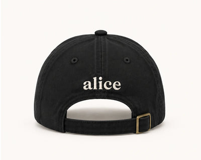 back of black alice dad hat with embroidered alice logo and brass buckle